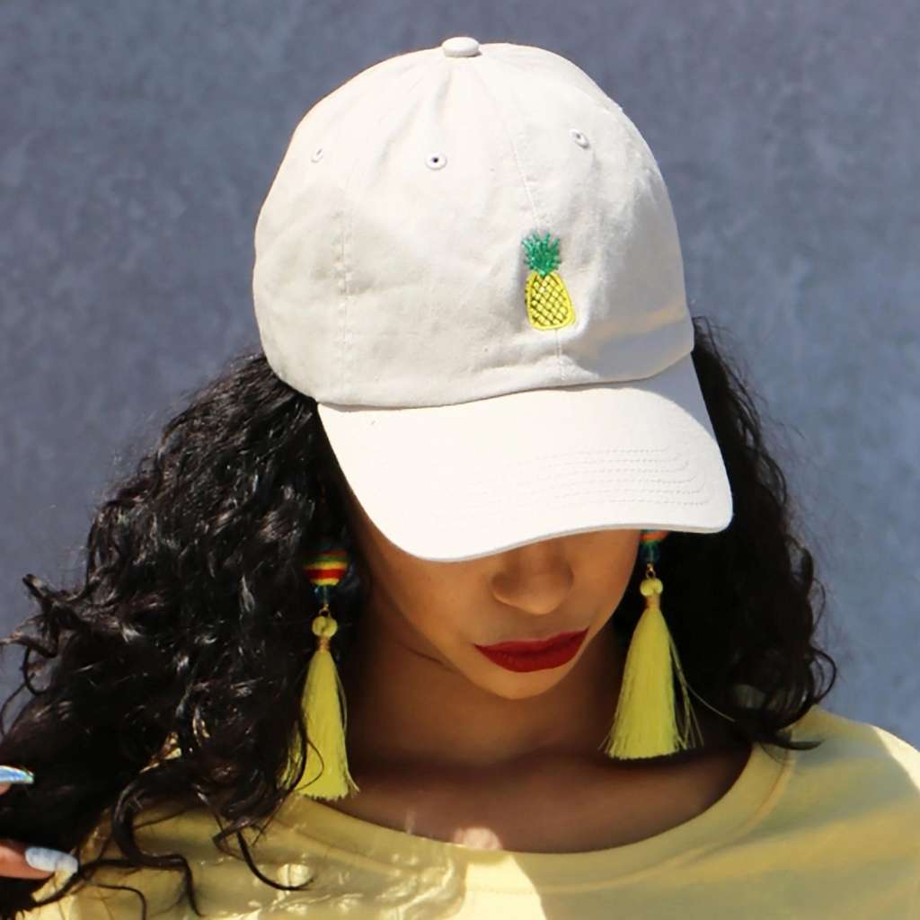 Model wearing a white baseball hat with pineapple embroidered - DSY Lifestyle