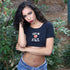 Female wearing black underboob top with feed me and tell me im pretty in white on the front - DSY Lifestyle