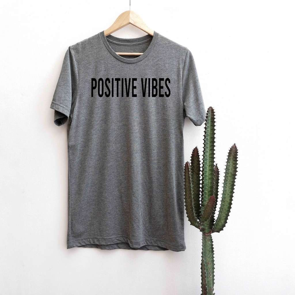 Gray graphic tshirt with Positive Vibes printed in the front- DSY Lifestyle