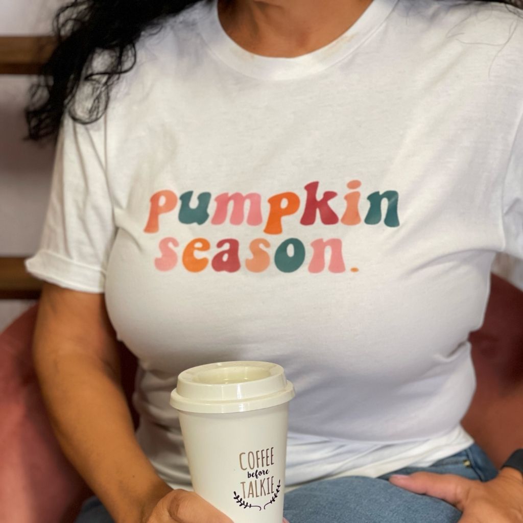 Female wearing a white tshirt with pumpkin season printed in the front - DSY Lifestyle