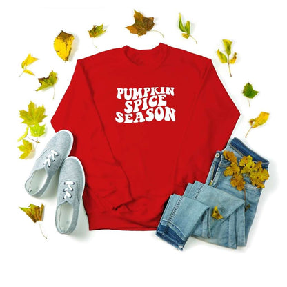 Unisex red sweatshirt with pumpkin spice sprinted in the front in white - DSY Lifestyle