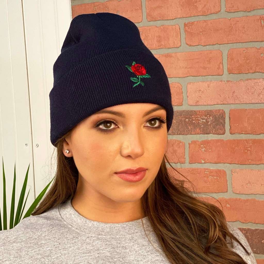 Model wearing black cuffed beanie with red rose embroidered on the front - DSY Lifestyle