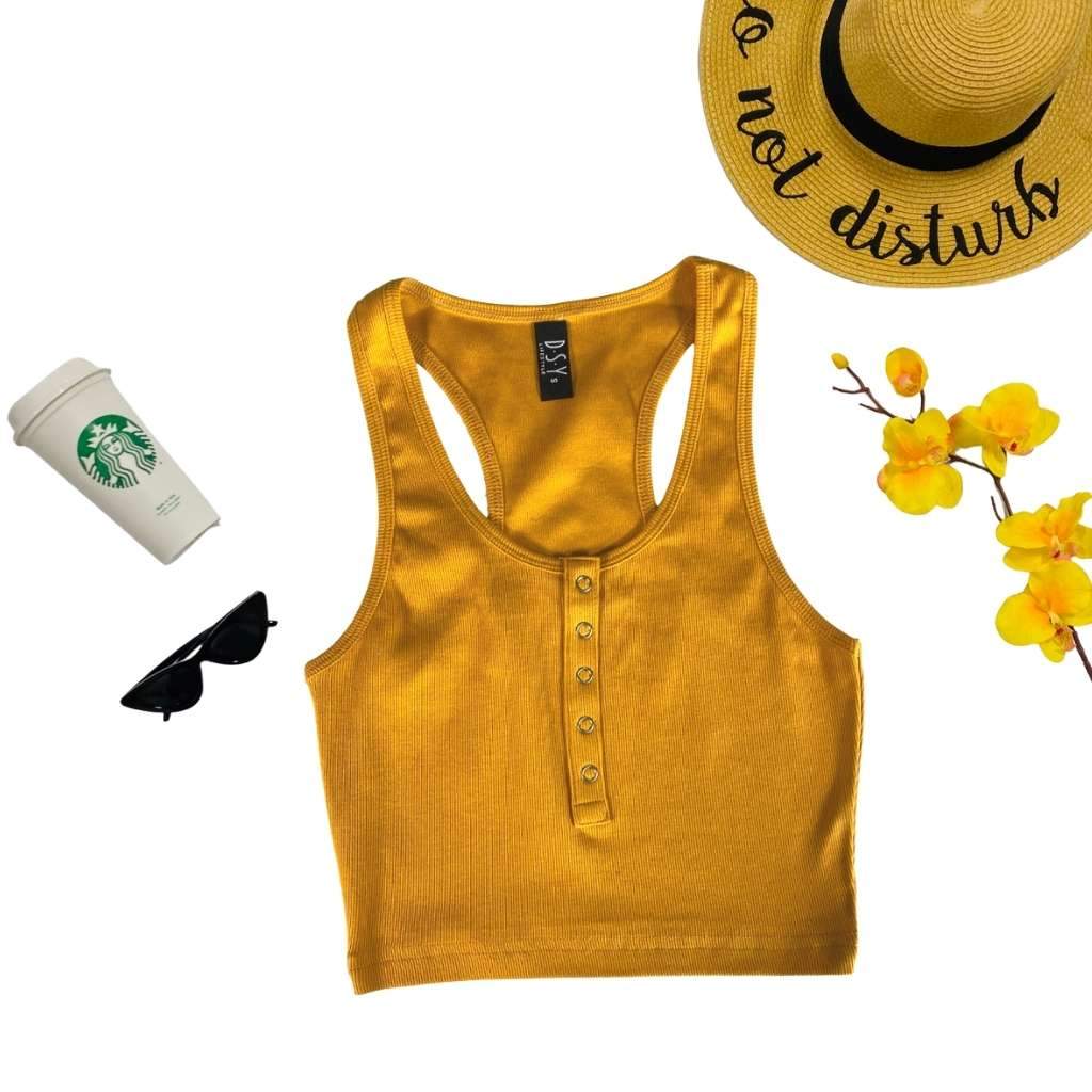 Flat Lay of mustard racerback crop top with snap closure - DSY Lifestyle