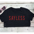 Flat lay of black underboob top with sayless on the front in red glitter vinyl - DSY Lifestyle