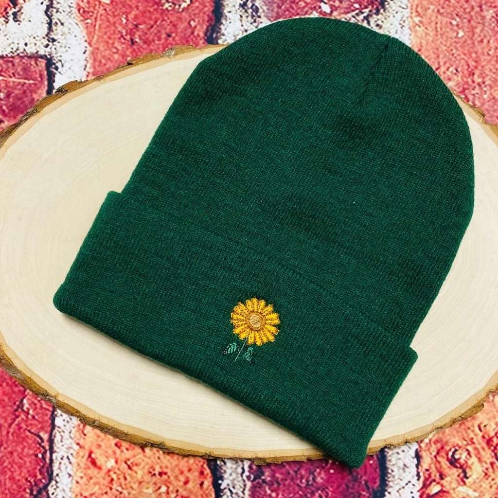 Forest green cuffed beanie with a sunflower embroidered on the front - DSY Lifestyle