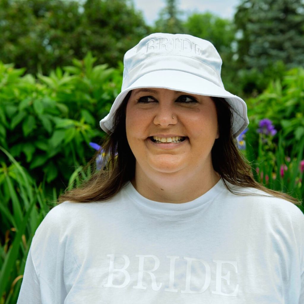 Female wearing a white bucket hat embroidered with Bride in white thread - DSY Lifestyle