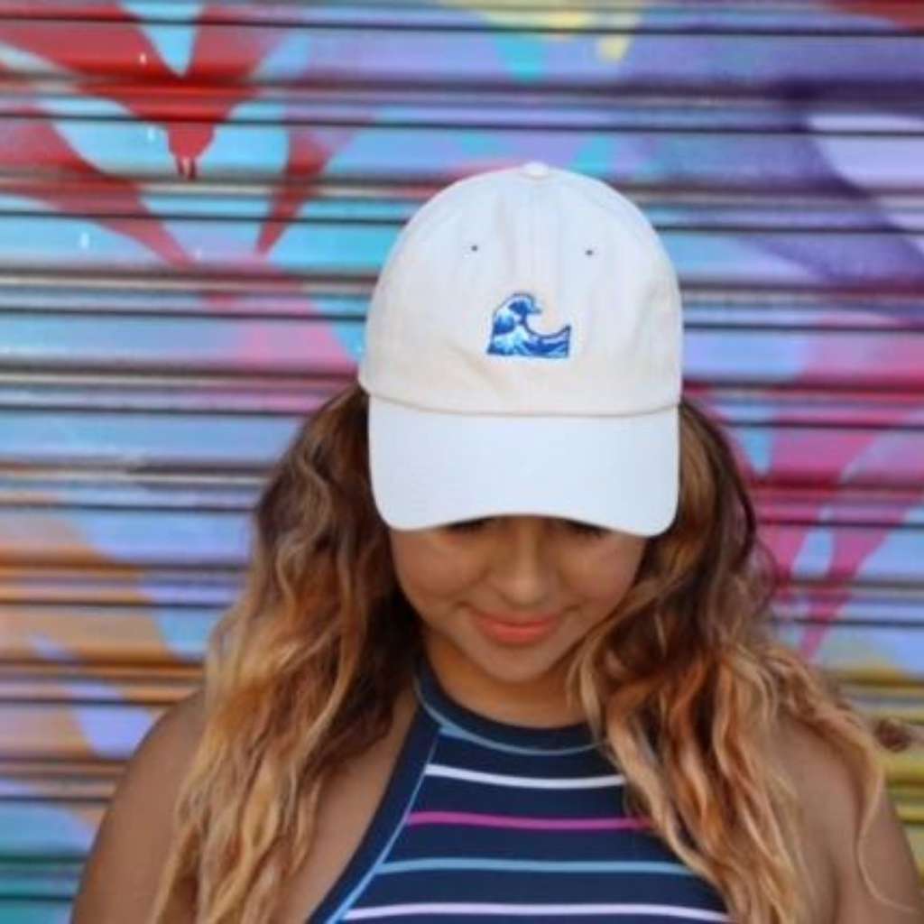 Female model wearing white baseball hat with wave embroidered - DSY Lifestyle