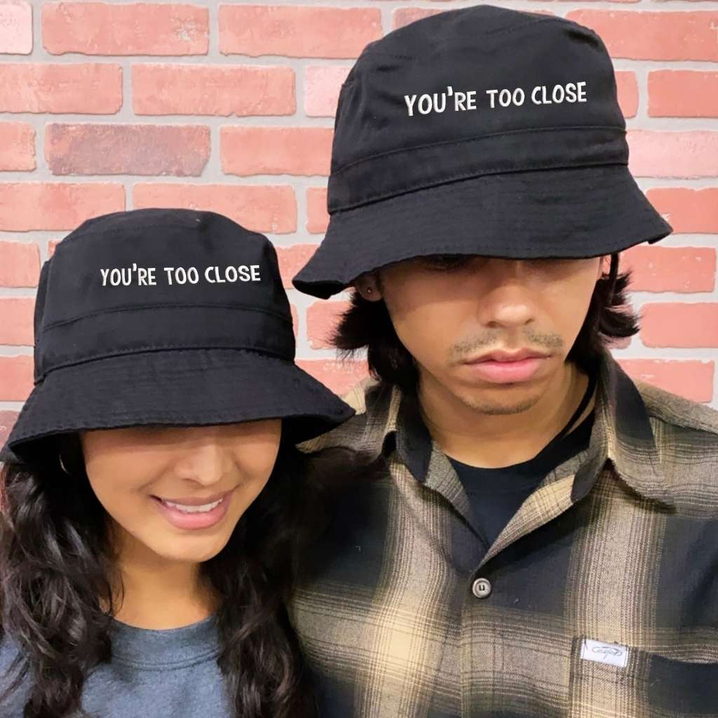 A couple wearing black You&