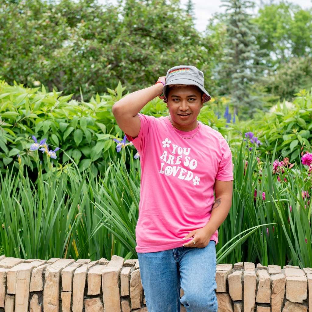 Male wearing a pink tshirt with You are so loved - DSY Lifestyle