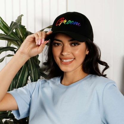 Model wearing black dad hat with groom embroidered in rainbow - DSY Lifestyle