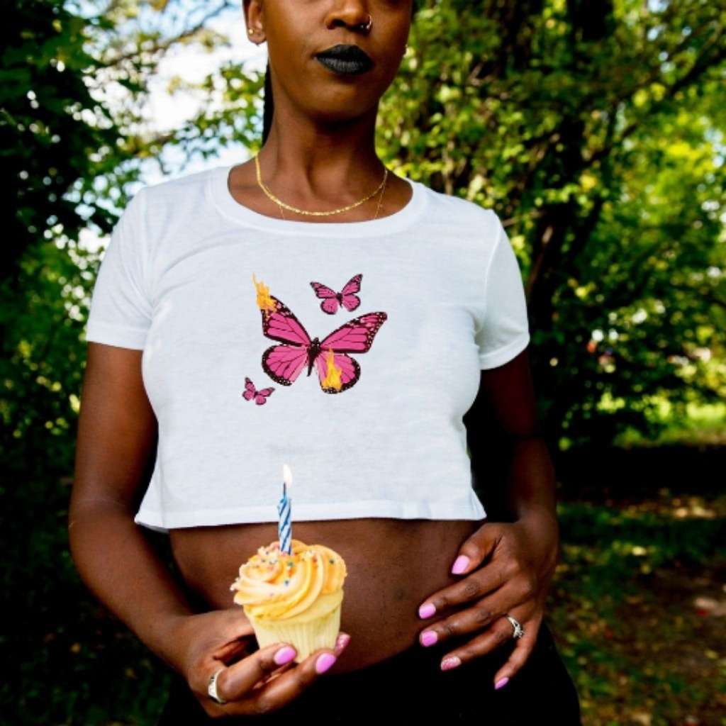 Model wearing white crop top with butterflies printed on it - DSY Lifestyle