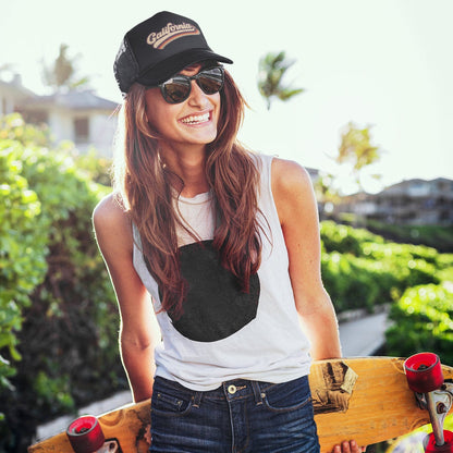 Female wearing a Black foam trucker hat with California printed in the front - DSY Lifestyle